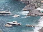 Positano molo con mare mosso Via del mare